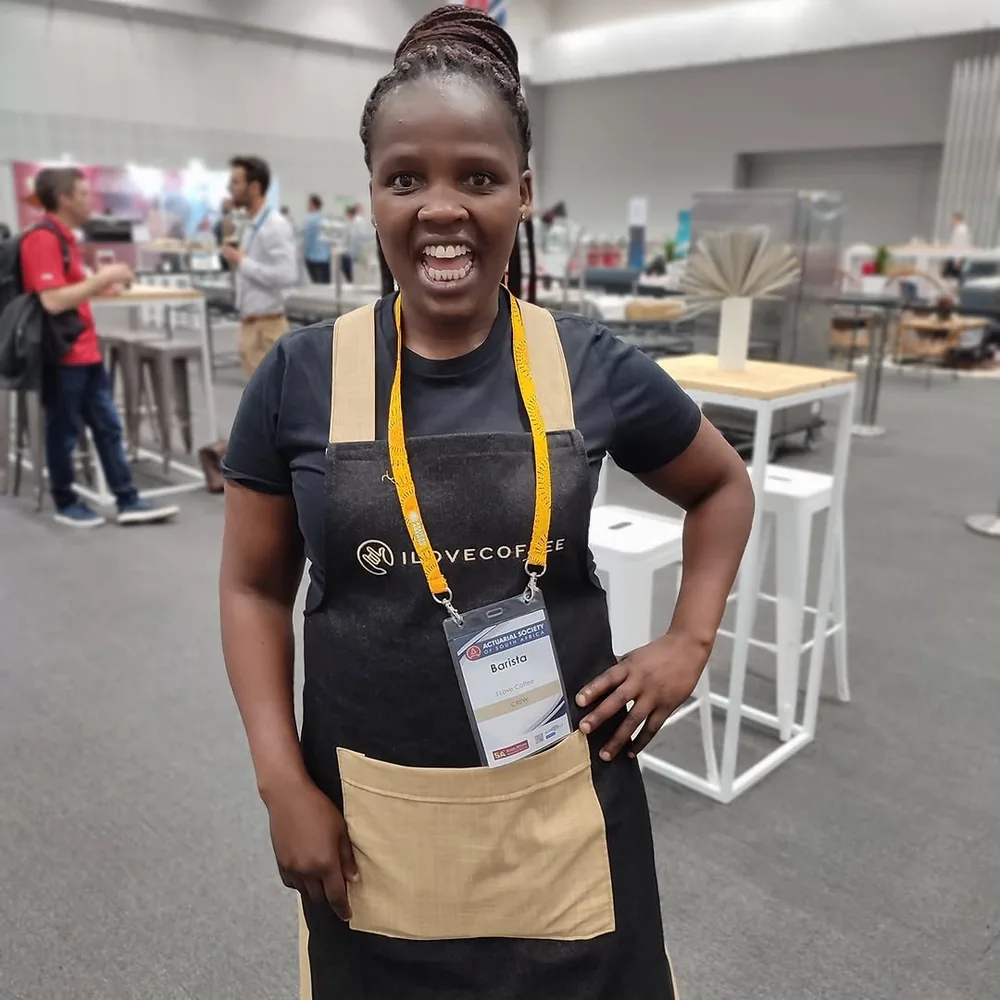 Delegate at a conference wearing a handmade branded lanyard