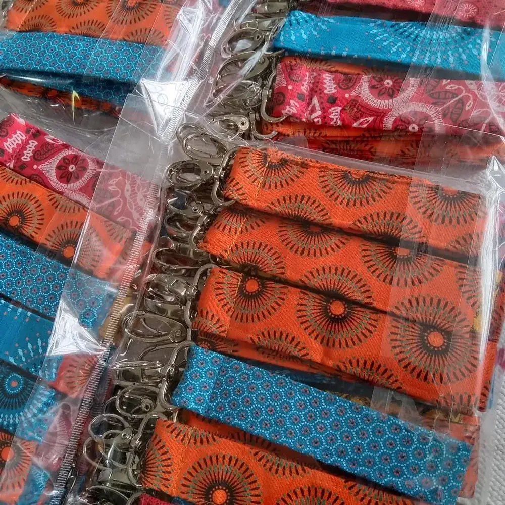 Handmade shweshwe fabric keyrings packed for a corporate gifting order